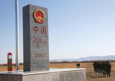 Chinese soldiers begin border patrol near past the newly unveiled boundary marker for eastern section of China-Russia border at Heixiazi Island, October 14, 2008. Half of the Heixiazi Island (Bolshoi Ussuriysky Island) was back to China's sovereign control after a ceremony that unveiled the boundary marker. Heixiazi Island was occupied by the former Soviet Union during a 1929 border skirmish. (Xinhua)